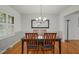 Cozy dining room with hardwood floors, natural light, and classic design at 5523 Newberry Dr, Raleigh, NC 27609