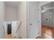 Stairwell leads to an upper level with bedroom view at 5523 Newberry Dr, Raleigh, NC 27609