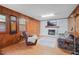 Living room boasting hardwood floors, a fireplace, and comfortable seating at 5523 Newberry Dr, Raleigh, NC 27609