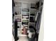 Organized closet with built-in shelving, providing ample storage space for clothes and personal items at 57 Winding Ridge Rdg, Sanford, NC 27332
