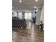Spacious living room features wood floors, a fireplace, and is bathed in natural light at 57 Winding Ridge Rdg, Sanford, NC 27332