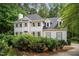 Charming two-story traditional home featuring neutral siding, dormers and professional landscaping at 5809 N Hawthorne Way, Raleigh, NC 27603