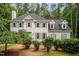 Well-maintained two-story home featuring gray shutters, dormer windows, and mature landscaping at 5809 N Hawthorne Way, Raleigh, NC 27603