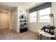 Cozy bedroom nook with comfortable seating, natural light and modern accents at 60 Rainfall Dr, Pittsboro, NC 27312