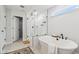 Bright bathroom featuring a sleek glass shower, a luxurious soaking tub, and stylish fixtures at 70 Noble Heart Pl, Fuquay Varina, NC 27526