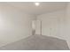 Bedroom with a carpeted floor, white walls, and two doors at 908 Adelphia Rd, Fuquay Varina, NC 27526