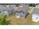 Two-story home featuring a well-maintained lawn and backyard space, perfect for outdoor enjoyment and entertaining at 908 Adelphia Rd, Fuquay Varina, NC 27526