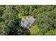 Birds eye view of home featuring a deck and mature trees at 92 Summer Dawn, Pittsboro, NC 27312