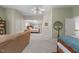 Upstairs space featuring a seating area, a bedroom, natural light, and neutral decor at 92 Summer Dawn, Pittsboro, NC 27312