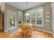 Breakfast nook featuring hardwood floors, a table with seating, and natural light at 92 Summer Dawn, Pittsboro, NC 27312