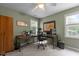 Bright home office with ceiling fan, two desks, and ample natural light at 92 Summer Dawn, Pittsboro, NC 27312