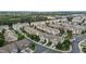 A neighborhood featuring townhomes in a suburban neighborhood with mature trees at 9302 Nellman Ln, Raleigh, NC 27617