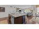Spacious kitchen view into a large open floor plan with living and dining areas at 9302 Nellman Ln, Raleigh, NC 27617