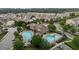 An aerial view of a large community pool and neighborhood at 9302 Nellman Ln, Raleigh, NC 27617