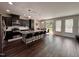 Spacious open-plan living area combining a dining space, a kitchen, and an inviting atmosphere at 1005 Lathrop Ln, Apex, NC 27523