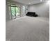 Expansive living room with sliding glass doors to the backyard offering a seamless transition to outdoor space at 1005 Lathrop Ln, Apex, NC 27523