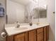 Bright bathroom featuring dual sinks, vanity, and decorative mirror at 101 Lake Tillery Dr, Cary, NC 27519