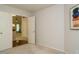 Bedroom with view into the hallway and neutral walls, perfect for relaxation at 101 Lake Tillery Dr, Cary, NC 27519