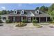 Beautiful clubhouse with brick facade, well-maintained landscaping and ample parking at 101 Lake Tillery Dr, Cary, NC 27519