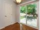 Cozy dining area with sliding glass doors opening to a patio and backyard at 101 Lake Tillery Dr, Cary, NC 27519