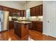 Spacious kitchen with granite countertops, stainless steel appliances, and hardwood floors, perfect for cooking at 101 Lake Tillery Dr, Cary, NC 27519