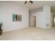 Spacious living room featuring neutral carpet, paint, and vaulted ceilings at 101 Lake Tillery Dr, Cary, NC 27519