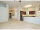 Open-concept living room offering great flow to kitchen at 101 Lake Tillery Dr, Cary, NC 27519
