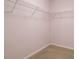 Spacious walk-in closet with wire shelving for organized storage solutions at 101 Lake Tillery Dr, Cary, NC 27519