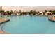 Spacious community pool offering plenty of room for swimming and relaxation, with seating and shade available at 1013 Poppy Fields Ln, Wake Forest, NC 27587