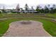 Community fire pit area with terraced seating and landscaping provides an inviting outdoor gathering space at 1013 Poppy Fields Ln, Wake Forest, NC 27587
