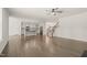 Open-concept kitchen with an island, stainless steel appliances, and a seamless flow to the living area at 1013 Poppy Fields Ln, Wake Forest, NC 27587