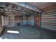 Inside a vintage log cabin featuring wood beam ceilings, stone fireplace, and light-filled windows at 1013 Poppy Fields Ln, Wake Forest, NC 27587