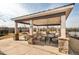 Community pavilion featuring picnic tables and stone-clad pillars provides a comfortable gathering space at 1013 Poppy Fields Ln, Wake Forest, NC 27587