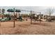 Community playground with swings, slides, and climbing structures offers outdoor recreation at 1013 Poppy Fields Ln, Wake Forest, NC 27587