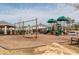 Community playground with swings, slides, and covered structures offers space for to play at 1013 Poppy Fields Ln, Wake Forest, NC 27587