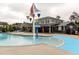 Community pool features a splash pad and clubhouse, perfect for outdoor enjoyment at 1013 Poppy Fields Ln, Wake Forest, NC 27587