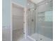 Shower with glass door and tile details at 1013 Poppy Fields Ln, Wake Forest, NC 27587