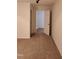 Bedroom with neutral carpet and open doorway at 1016 Dotson Way, Apex, NC 27523