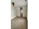 Bonus room featuring neutral carpet, high ceilings, and a window for lots of natural light at 1016 Dotson Way, Apex, NC 27523