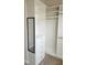 Custom closet featuring built-in shelves, drawers, rods, and a mirror for easy access at 1016 Dotson Way, Apex, NC 27523