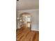 Elegant living area showcasing wood floors, archway and neutral wall color at 1016 Dotson Way, Apex, NC 27523