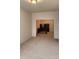 Living room with neutral carpet that could be used as an office at 1016 Dotson Way, Apex, NC 27523