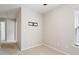 Neutral bedroom with carpet and TV wall mount, creating a cozy space at 1016 Goldmist Ln, Durham, NC 27713