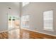 Bright living room with sliding glass doors to the backyard at 1016 Goldmist Ln, Durham, NC 27713