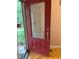 Inviting front door features decorative glass detail and allows natural light to fill the entry way at 105 Perry Ln, Zebulon, NC 27597
