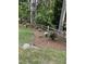 Garden bed with flowers and split rail wooden fence at 105 Perry Ln, Zebulon, NC 27597