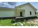 The exterior of the home shows clean, bright siding with brick foundation and a covered entrance, perfect for curb appeal at 107 Lynn Ln, Selma, NC 27576
