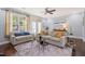 Well-decorated living room with comfortable seating, a stylish rug, and modern decor at 108 Hundred Oaks Ln, Holly Springs, NC 27540