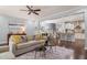 Inviting living room with an open floor plan leading to the kitchen and dining area at 108 Hundred Oaks Ln, Holly Springs, NC 27540