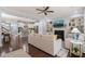Open concept living area with hardwood floors connecting to the kitchen and dining space at 108 Hundred Oaks Ln, Holly Springs, NC 27540